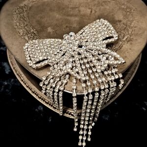 Large Articulated Pave Rhinestone Bow Brooch With Dangling Crystal Strands